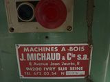 a machine that has a sign on the side of it