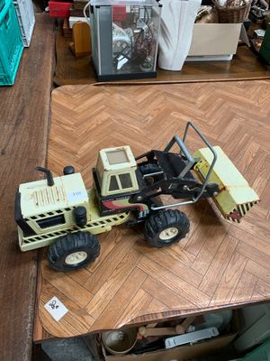 Engin de travaux publics en réduction - Photo 1