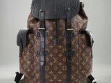Sac à dos Louis Vuitton en toile Monogram et cuir