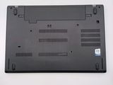 a black laptop that is sitting on a table