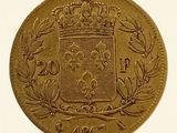 Gros plan sur une pièce d'or ornée d'une couronne