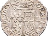an old silver coin with a crown on top of it