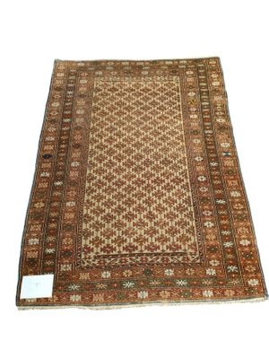 Tapis d'Orient en laine fait main, à décor de croix stylisée…