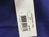 a close up of a blue shirt with a tag on it
