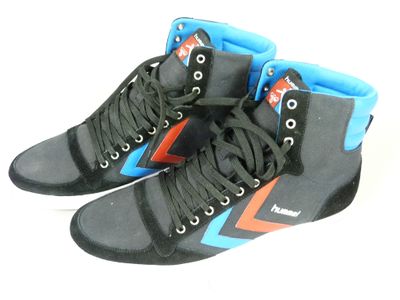 pair of black and blue high top sneakers with orange and blue accents