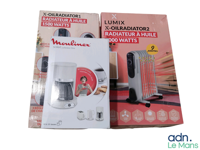two packages of appliances sitting on a table next to each other