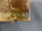 a picture of a piece of art on display on a table