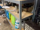 a shelf that has a lot of tools on it