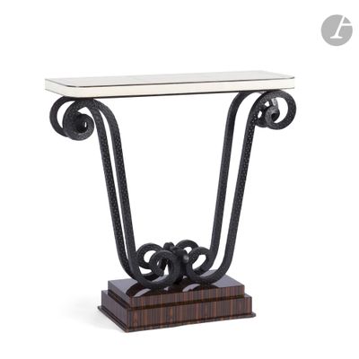 a black and white console table with a glass top