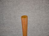a close up of a baseball bat on a table