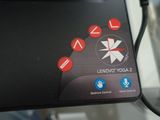 a close up of a remote control on a table