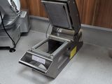 a machine that is sitting on a counter in a kitchen