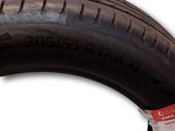 a tire with a sticker on the side of it