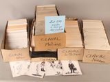 several boxes of cards are stacked on top of each other on a table