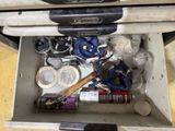 a tool in the open drawer of a toolbox