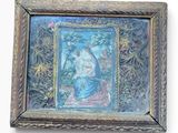 an old picture of a painting of a woman and child in a frame