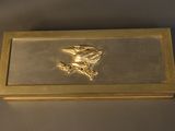 gold plated business card holder with a bird on it