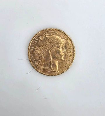 an image of a gold coin on a white surface