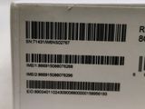 the back of a white box with a bar code on it