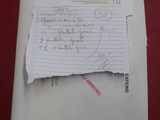 a piece of paper on top of a piece of paper