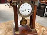 a clock that is sitting on top of a table