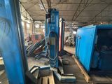 a machine that is sitting on a pallet in a warehouse