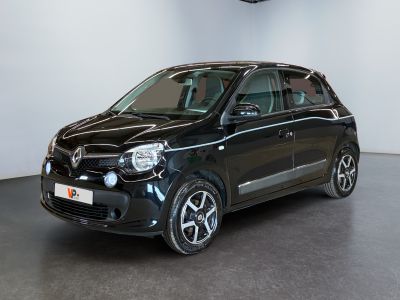 a picture of a small black car in a showroom