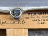 a close up of a piece of wood with a label on it