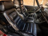 an image of a car with leather seats and a steering wheel