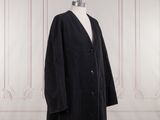 un manteau noir sur un mannequin mannequin mannequin mannequin mannequin mannequin mannequin mannequin mannequin mannequin