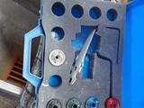 a close up of a blue box with wires attached to it