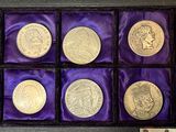an image of a display case filled with different types of coins