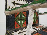 a close up of a chair made out of a piece of cloth