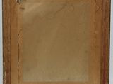 an old picture of a wooden frame with a picture in it