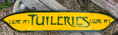 a yellow and green sign that says tuller ' s on it