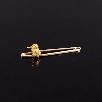 Épingle en or rose 9k (375e), appliqué d'un oiseau sur sa br… - Photo 1