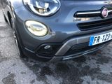 the front end of a grey fiat suv parked in a parking lot