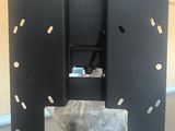 a picture of a tv wall mounted on a pole