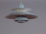a light that is hanging from the ceiling in the room