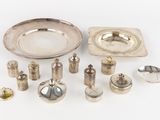 a lot of silver items that are on a table