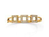 un bracelet en or jaune serti de diamants sur fond blanc