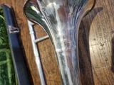 a spoon and a spoon rest on a wooden table