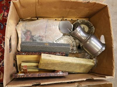 a box full of assorted items sitting on the floor