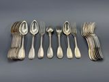 un ensemble de six couverts (fourchettes et cuillères) en métal argenté