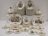 a lot of plates and bowls on the table