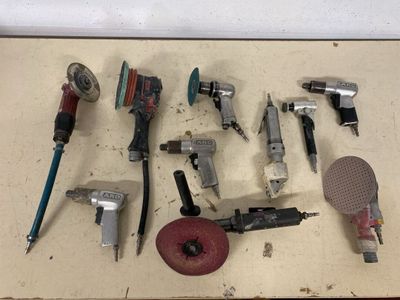 a lot of tools that are sitting on a table