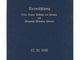 a blue book with gold lettering on it and a white background