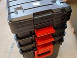 a close up of a plastic tool box on a table in a warehouse