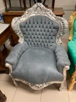 Bergère en bois argenté. Larg. 78.