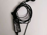 a cord that is connected to a charger on a table
